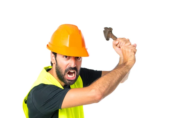 Workman med skiftnyckel över vit bakgrund — Stockfoto