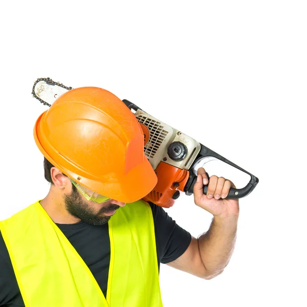 Workman with chainsaw over white background — Stock Photo, Image