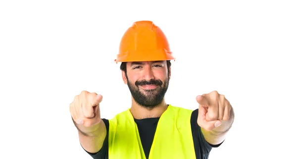 Workman pointing to the front over white background — Stock Photo, Image