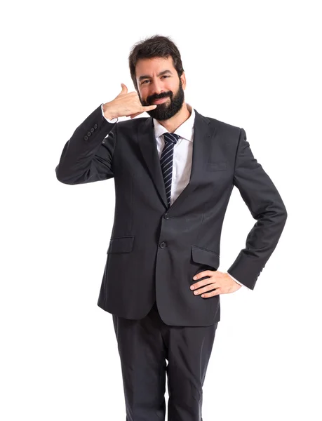 Empresário fazendo gesto telefone sobre fundo branco — Fotografia de Stock