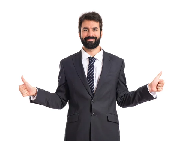 Businessman with thumb up over white background — Stock Photo, Image