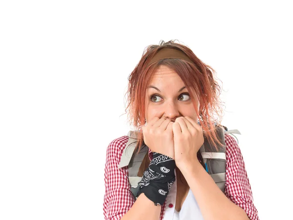 Frightened backpacker over isolated white background — 图库照片