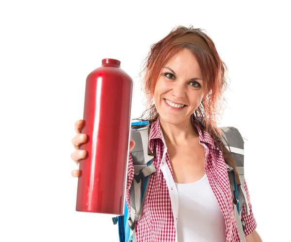 Woman with canteen over white background — Stock Photo, Image