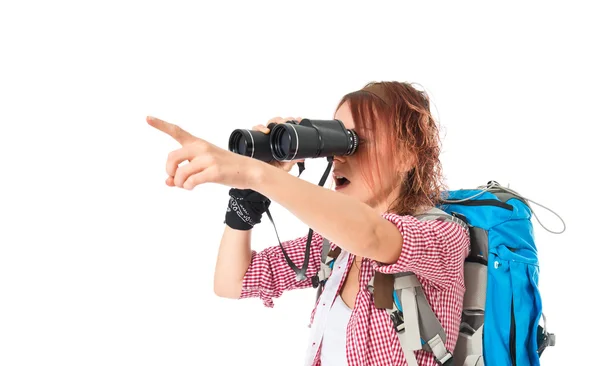 Girl looking through binoculars over white background — Stock Photo, Image