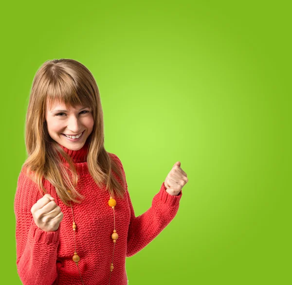 Lucky woman over green background — Stock Photo, Image