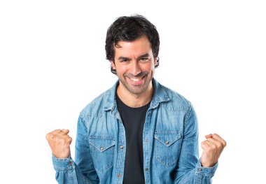 şanslı bir genç adam izole beyaz zemin üzerine