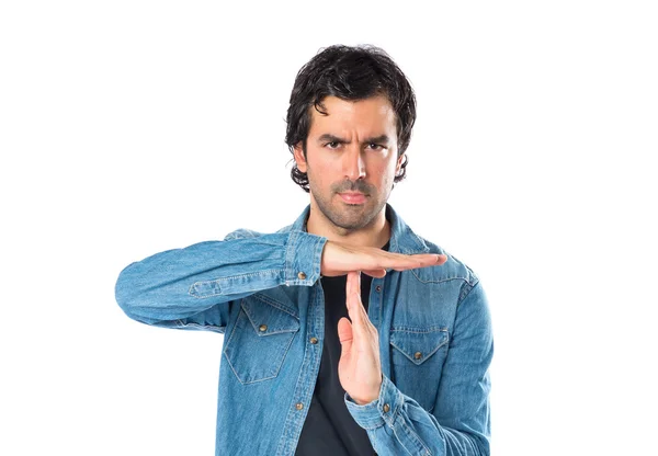 Man making time out gesture over white background — Stock Photo, Image
