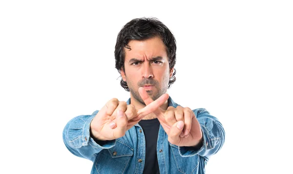 Man doing NO gesture over white background — Stock Photo, Image