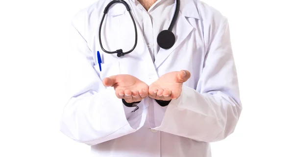 Doctor holding something over white background — Stock Photo, Image