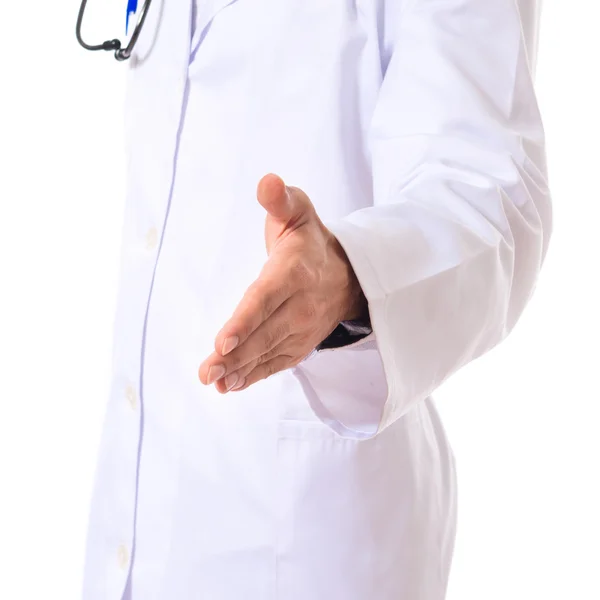 Doctor making a deal over isolated white background — Stock Photo, Image