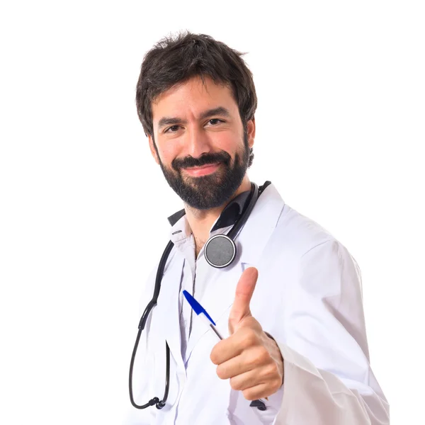 医生用大拇指在白色的背景 — 图库照片