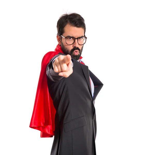 Businessman dressed like superhero pointing to the front — Stock Photo, Image