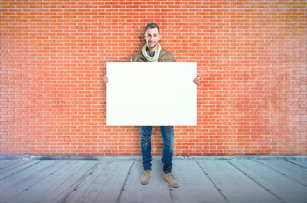 Homem com placard vazio — Fotografia de Stock