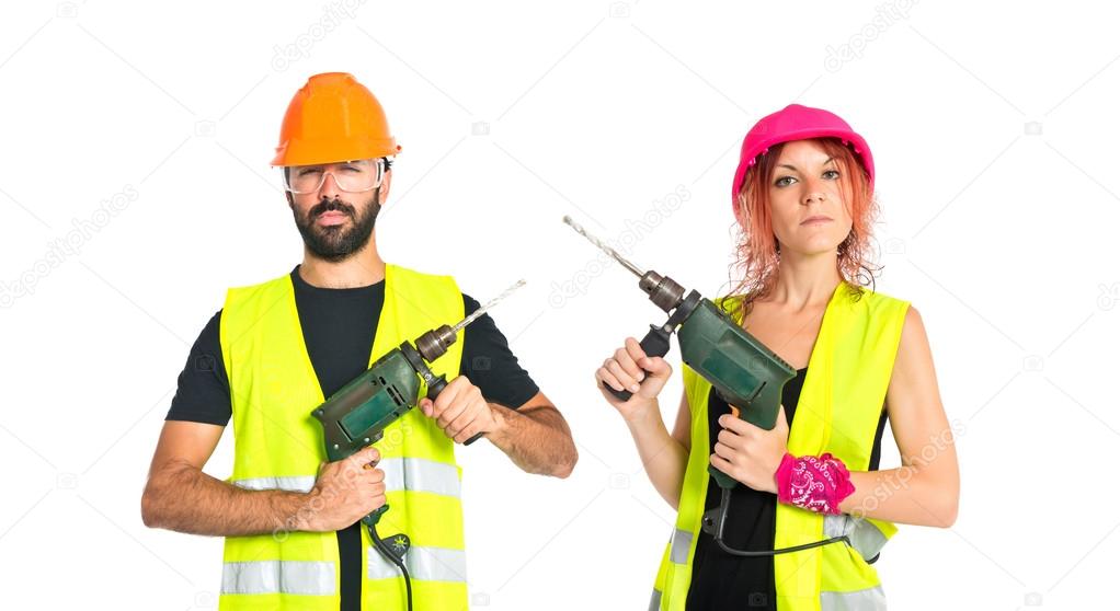 workman with drill over white background