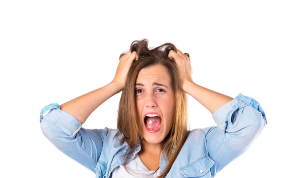 Frustrated girl over isolated white background — Stock Photo, Image