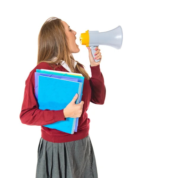 Estudante gritando por megafone sobre fundo branco — Fotografia de Stock