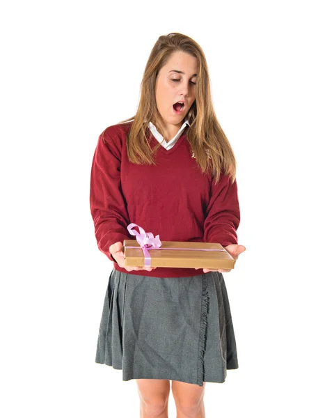 Student doing surprise gesture over white background — Stock Photo, Image