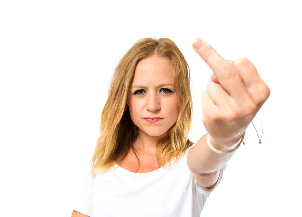 Chica haciendo gesto cuerno sobre fondo blanco — Foto de Stock