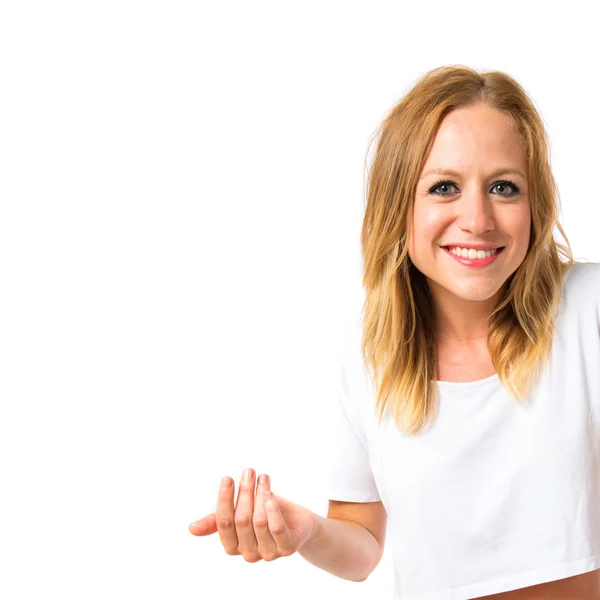 Happy blonde girl over white background — Stock Photo, Image