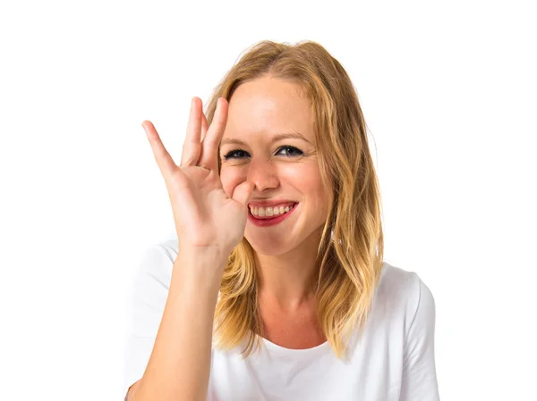 Girl making a joke over white background — Stock Photo, Image