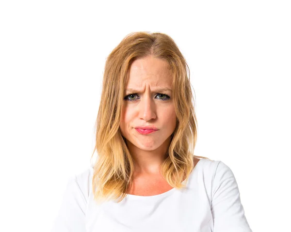 Girl with her arms crossed over white background — Stock Photo, Image