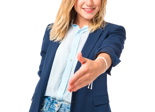 Young woman making a deal over isolated white background — Stock Photo, Image