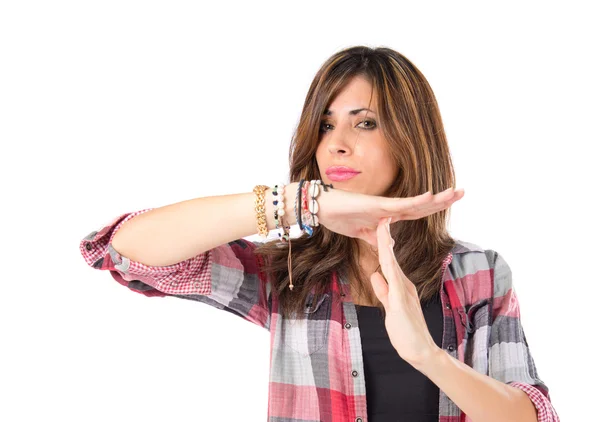 Girl making time out gesture over white background — Stock Photo, Image