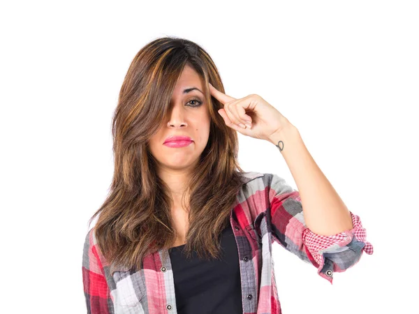 Girl making crazy gesture over white background — Stock Photo, Image