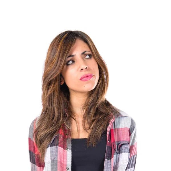 Girl thinking over isolated white background — Stock Photo, Image