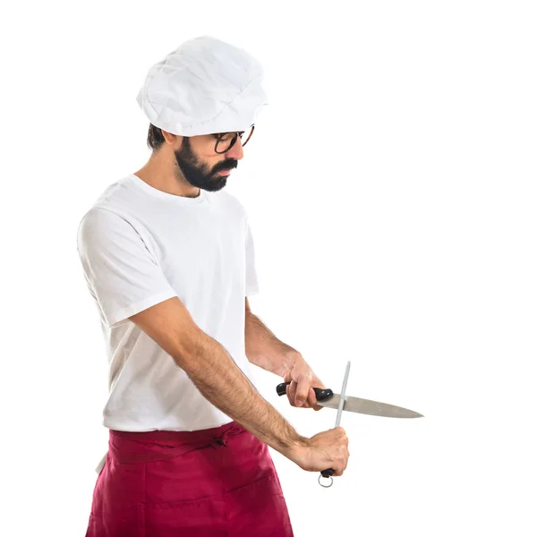 Kocken slipa en kniv — Stockfoto