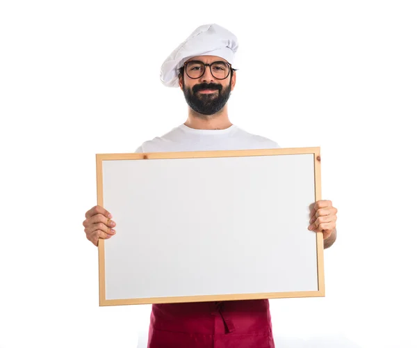 Chef feliz sosteniendo cartel vacío — Foto de Stock