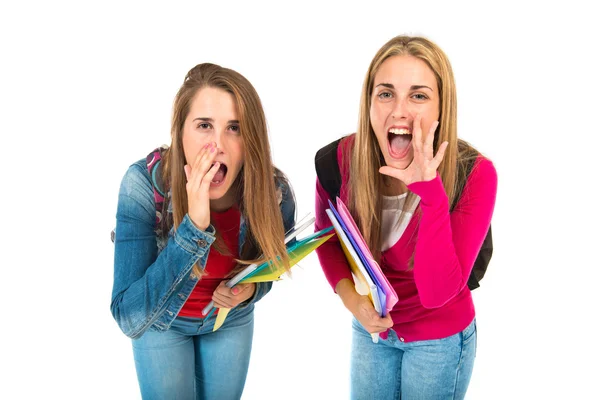 Student women shouting over isolated white background — Stock Photo, Image