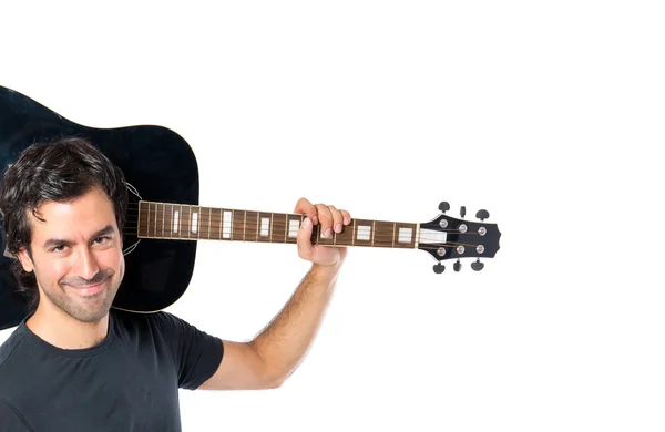 Stilig man med gitarr över vit bakgrund — Stockfoto