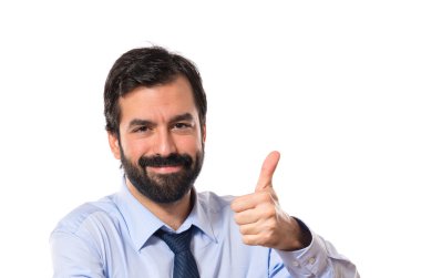 Beyaz arka plan üzerinde başparmak ile Businesssman