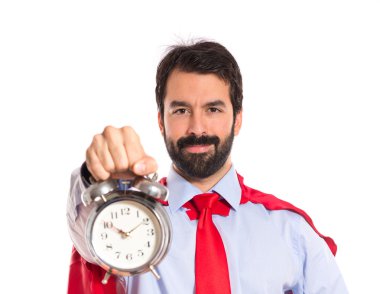 İşadamı bir saat tutan süper kahraman gibi giyinmiş