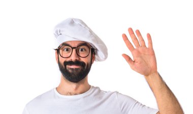 Beyaz arka plan üzerinde selamlayan Şef