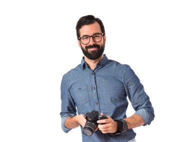 Genç hipster adam ile onun fotoğraf makinesi