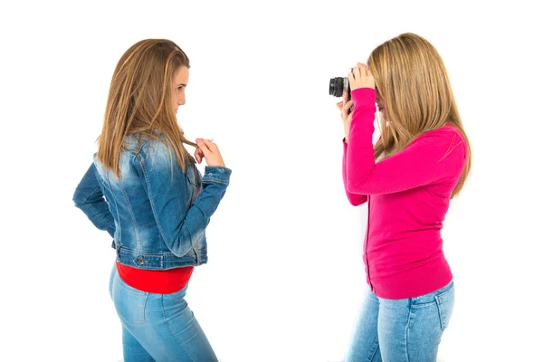 Studente donna fotografare su sfondo bianco — Foto Stock