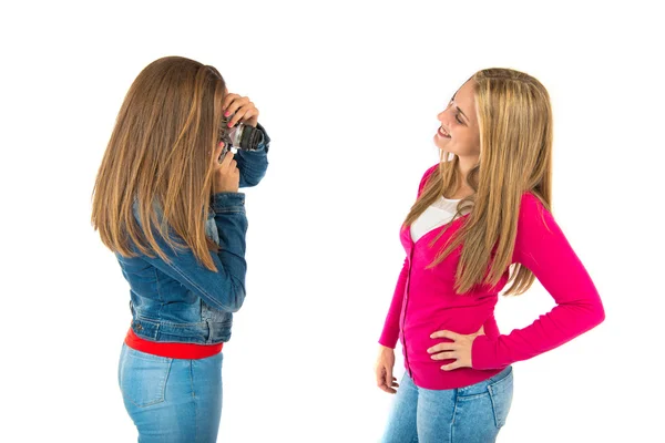 Student woman photographing over white background — Stock Photo, Image