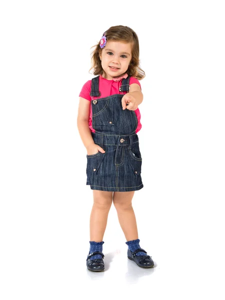 Kid pointing to the front over white background — Stock Photo, Image