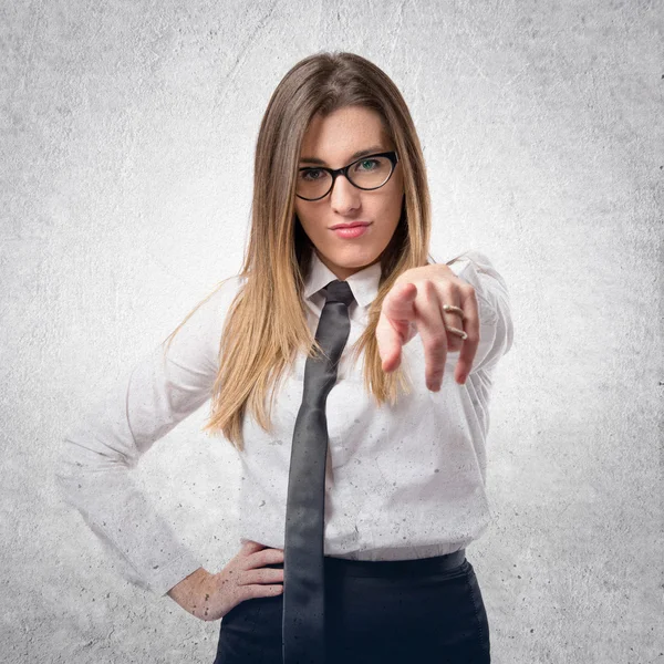 Young pretty businesswoman pointing over white background — Stock Photo, Image