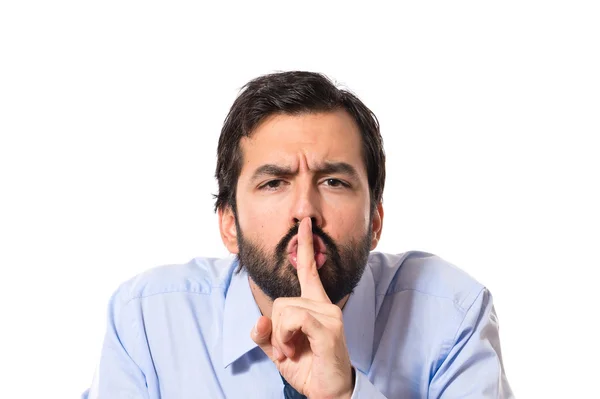 Businessman making silence gesture — Stock Photo, Image