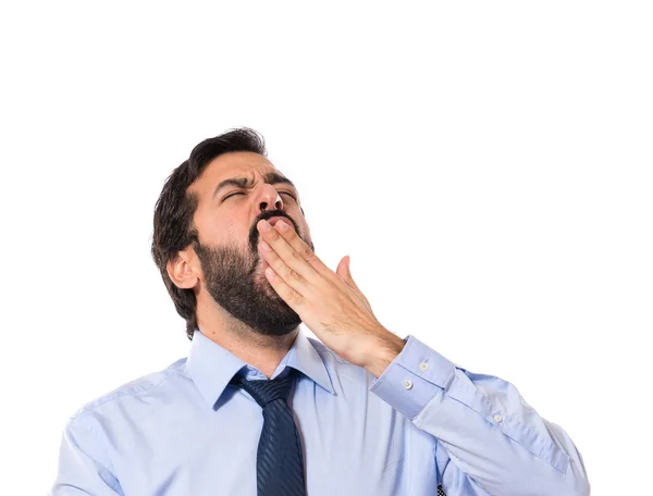 Empresario bostezando sobre fondo blanco — Foto de Stock