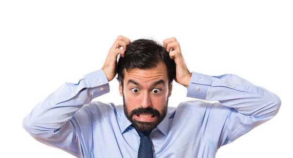 Frustrated businessman over white background — Stock Photo, Image