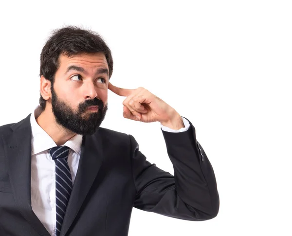 Empresario haciendo gesto loco sobre fondo blanco — Foto de Stock