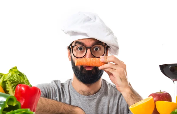 Crazy hipster chef with carrot like moustache