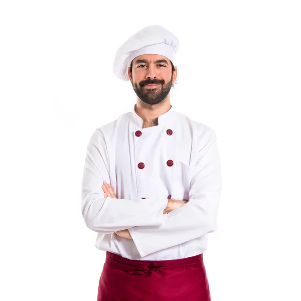 Šéfkuchař s rukama založenýma na bílém pozadí — Stock fotografie