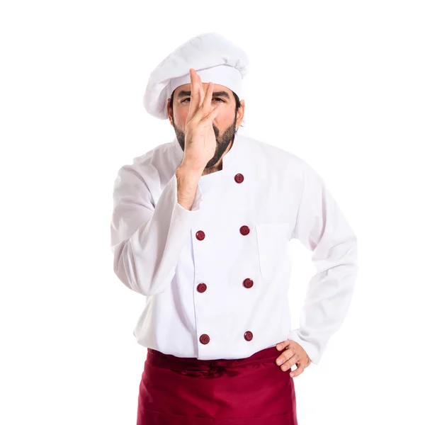 Chef-kok maken van een grap op witte achtergrond — Stockfoto
