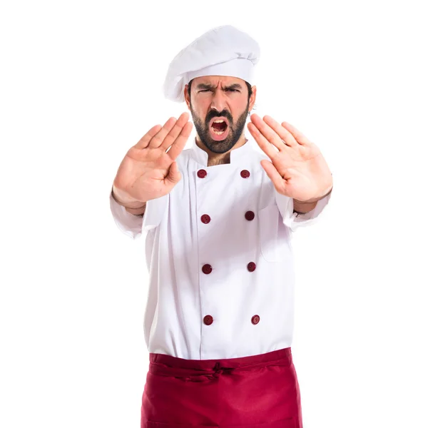 Chef making stop sign over white background — Stock Photo, Image