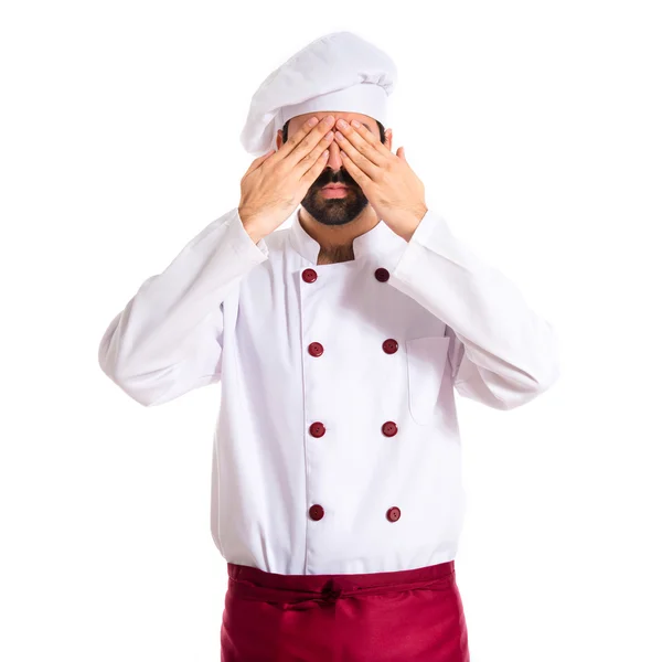 Chef covering his eyes over white background — Stock Photo, Image